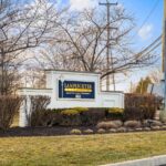 Lamplighter.Village.sign